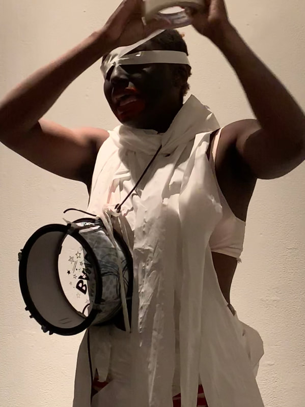 UNISKA WHALA KANO in performance at Performance Anxiety, Chinatown Soup NYC | photo by Alex Sullivan