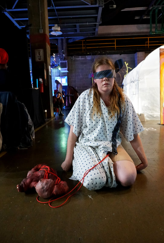Alison Pirie (Brooklyn, NY, USA), performs Prisoners of the Strange Organ That Dwells Within Them (roaming), Performance is Alive at Satellite Art Show 2019 | Photo by Rachel Rampleman